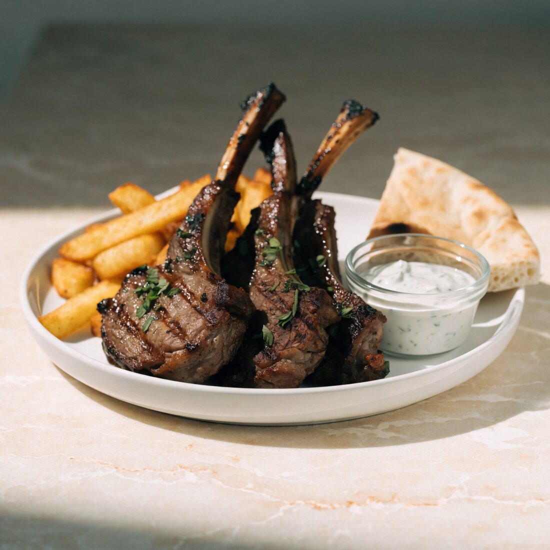 Tender greek style lamb chops seasoned to perfection